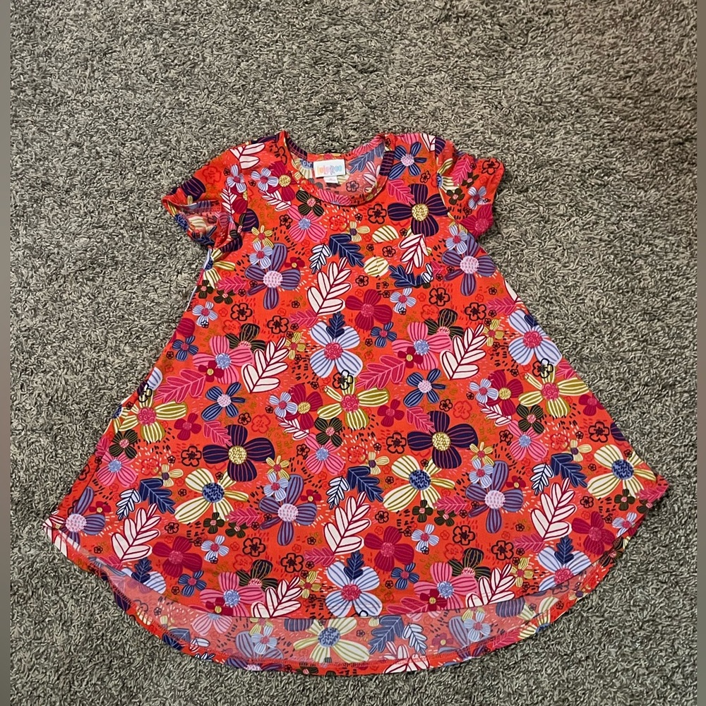 Girls LulaRoe dress size 6. Longer in the back.